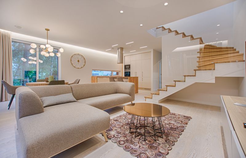 Lift interior with soft morning light on mirrored walls